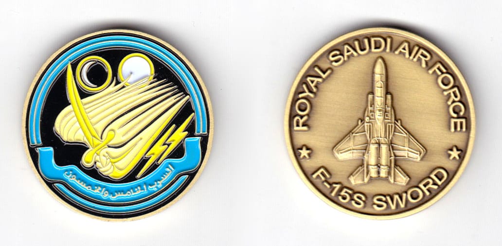 Round shaped coin, brass in color, 1 31/64 inches in diameter.

SIDE 1 - flying saber

SIDE 2  -