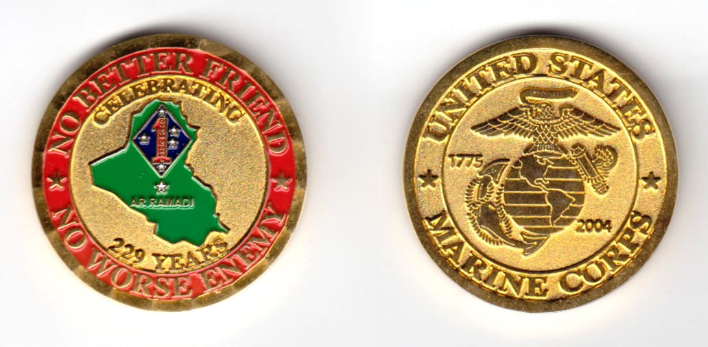 Round shaped coin, gold in color, 1 1/2 inches in diameter.