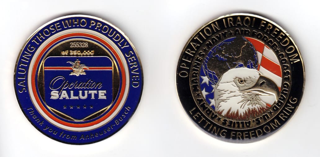 Round shaped coin, gold in color, 2 inches in diameter.