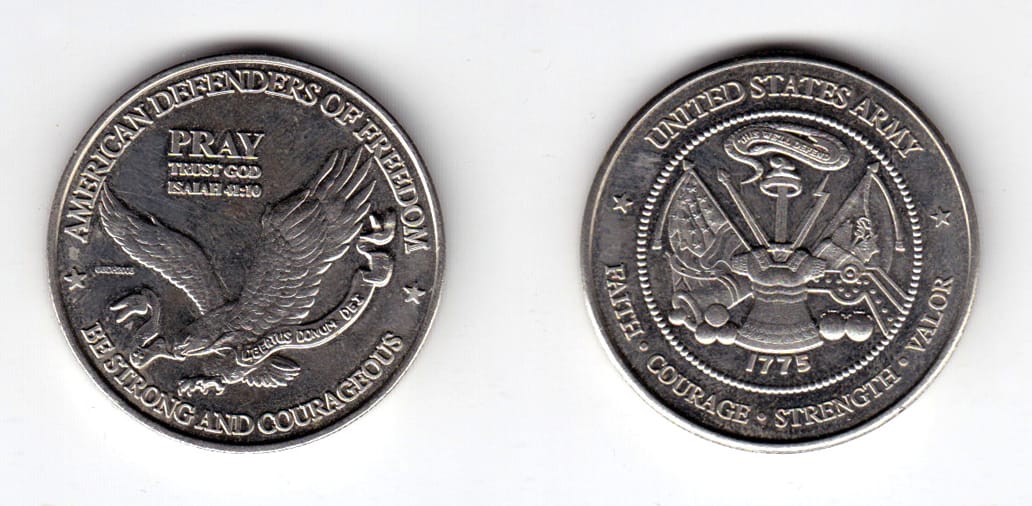 Round shaped coin, silver in color, 1 1/2 inches in diameter.