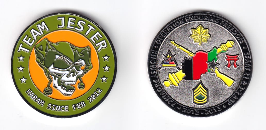 Round shaped coin, pewter in color, 2 1/64 inches in diameter.