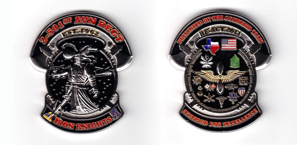 Round shaped coin with banners above and below, pewter in color, 2 33/64 inches high x 2 9/64 inches wide.