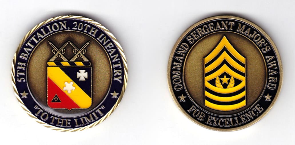 Round shaped coin, brass in color, 1 13/16th inches in diameter.