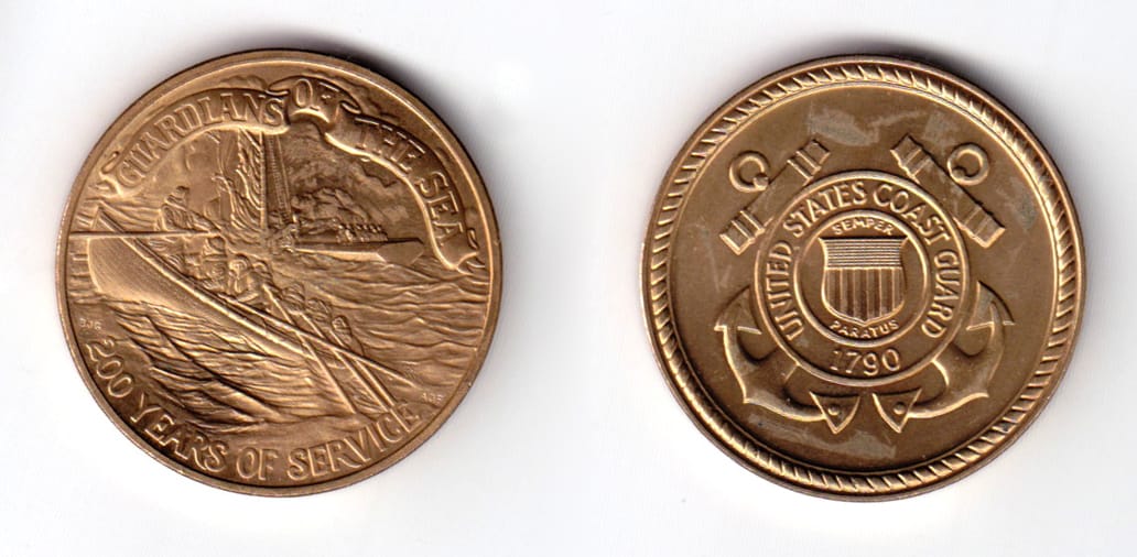 Round shaped coin, antique brass in color, 1 1/2 inches in diameter.