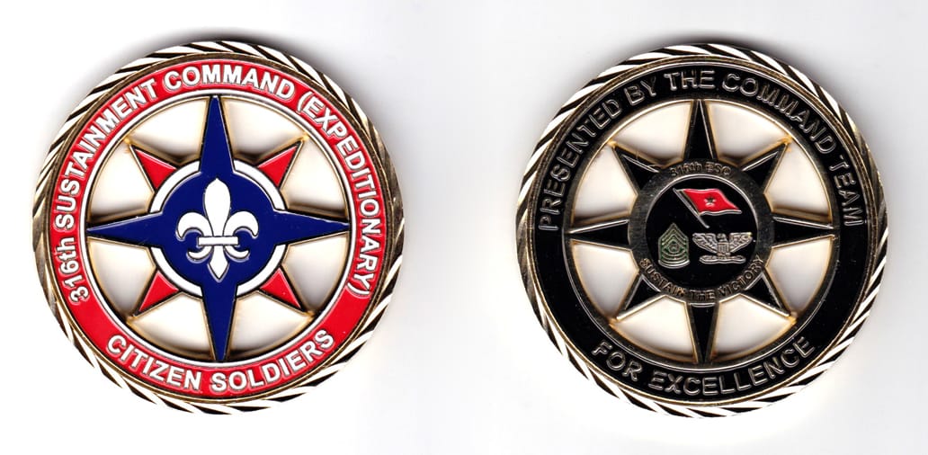 Round shaped coin, brass in color, 2 1/2 inches in diameter.