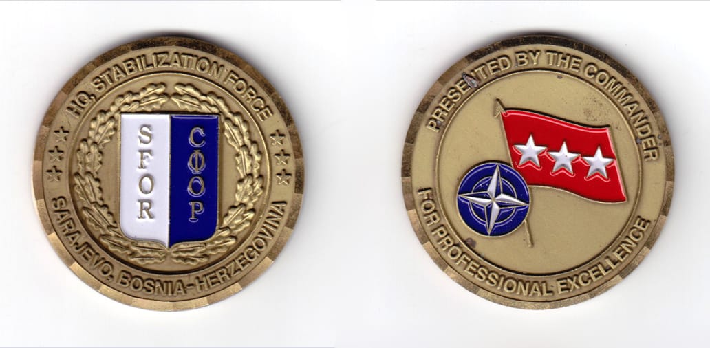 Round shaped coin, antique brass in color, 2 3/8 inches in diameter.