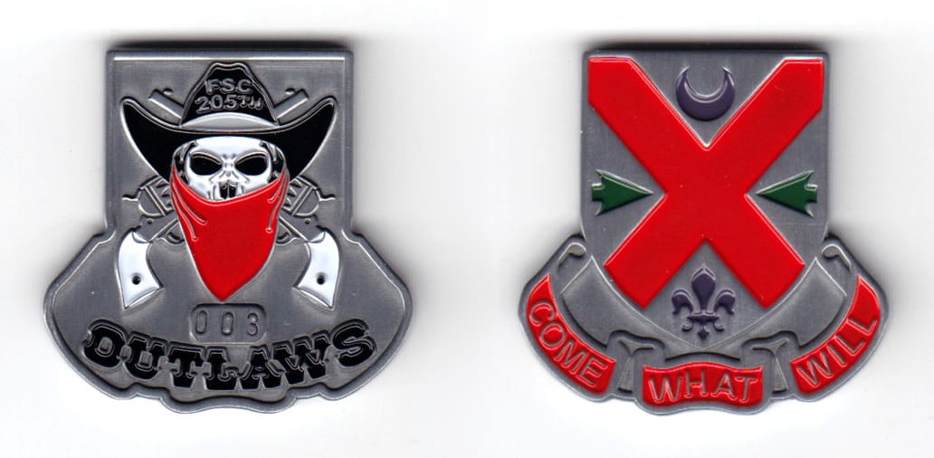 Shield shaped coin with banner below, pewter in color, 1 31/64 inches high x 1 33/64 inches wide.