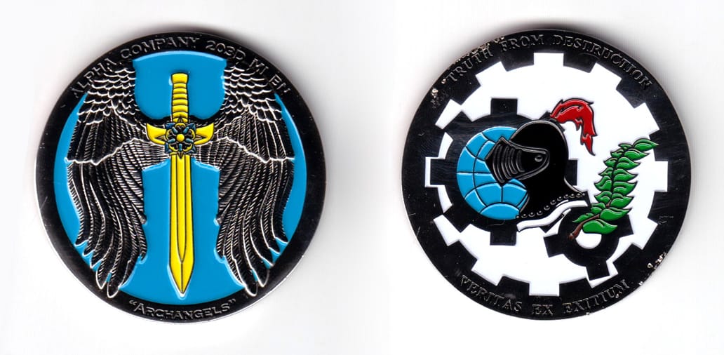 Round shaped coin, silver in color, 2 inches in diameter.