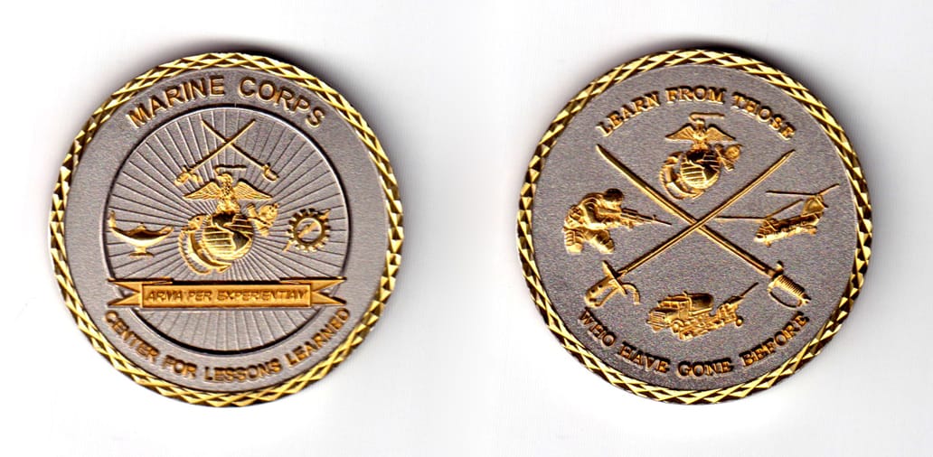 Round shaped coin, pewter in color, 1 3/4 inches in diameter.