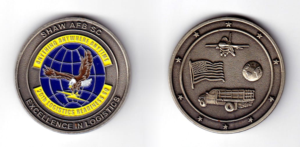 Round shaped coin, antique brass in color, 1 3/4 inches in diameter.