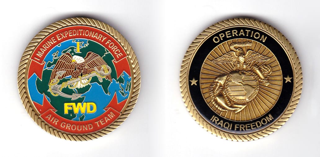 Pentagon shaped coin, antique brass in color, 1 57/64 inches high x 2 inches wide.