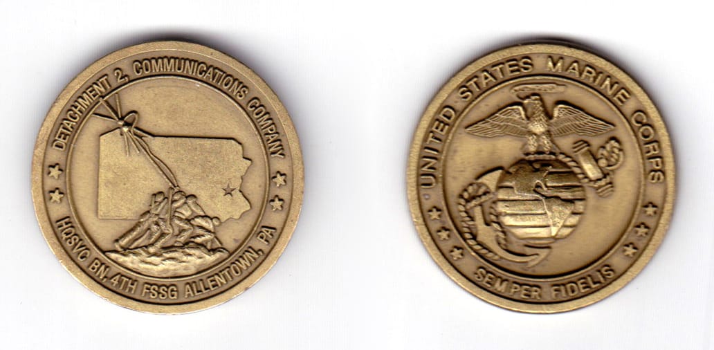 Round shaped coin, antique brass in color, 1 19/32 inches in diameter.