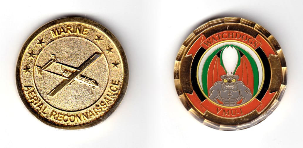 Round shaped coin, gold in color, 1 5/8 inches in diameter.