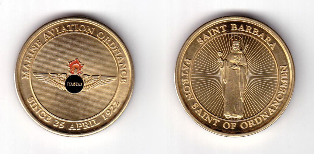 Round shaped coin, brass in color, 1 19/32 inches in diameter.