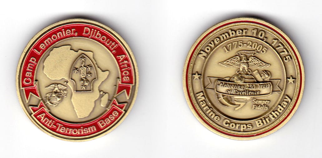 Round shaped coin, antique brass in color, 1 9/16 inches in diameter.