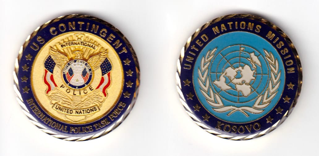 Round shaped coin, brass in color, 149/64 inches in diameter