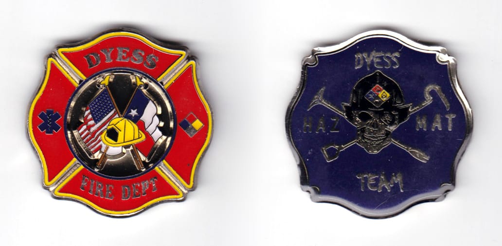 Coin is shaped in traditional 4-petal flower, fire department emblem; pewter in color, 1 49/64 inches high x 1 3/4 inche...