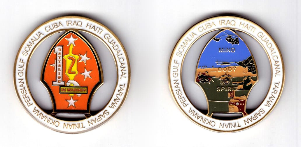 Round shaped coin, antique brass in color, 1 3/4 inches in diameter.