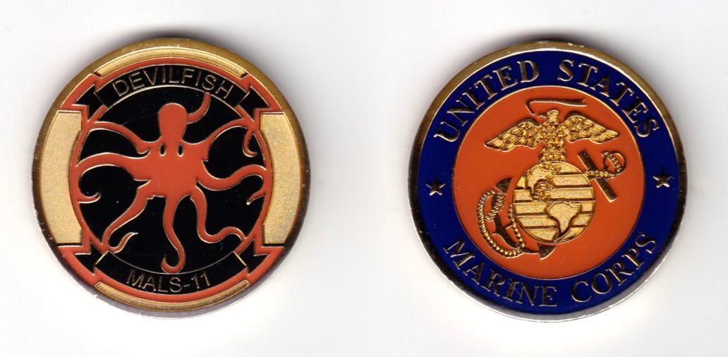 Round shaped coin, brass in color, 1 1/2 inches in diameter.