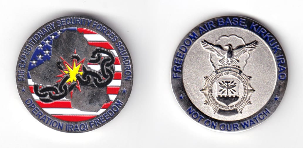 Round shaped coin, pewter in color, 1 37/64 inches in diameter.