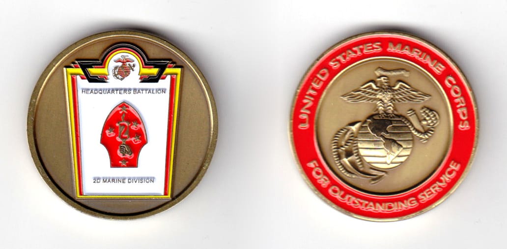 Round shaped coin, brass in color, 1 1/2 inches in diameter.