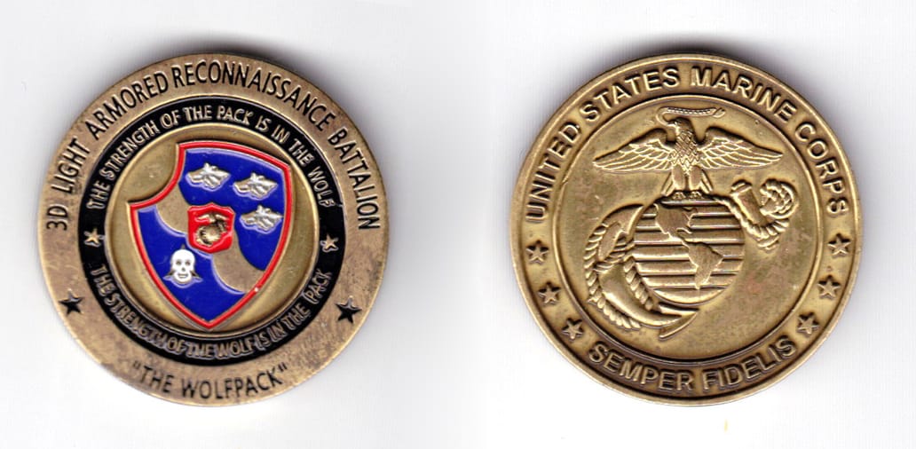 Round shaped coin, antique brass in color, 1 1/2 inches in diameter.