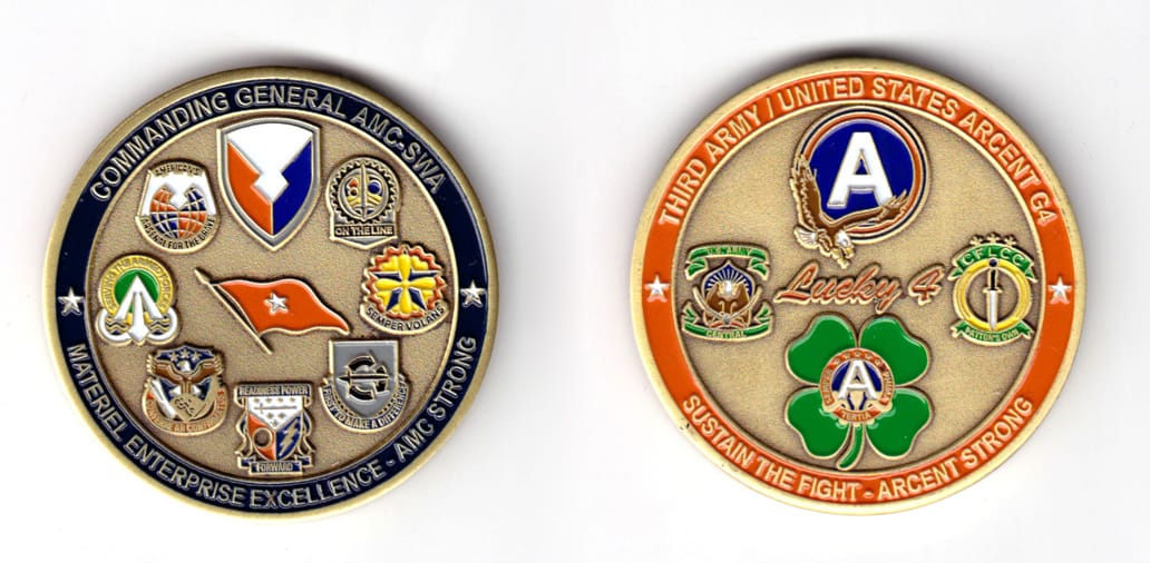 Round shaped coin, brass in color, 2 1/64 inches in diameter.