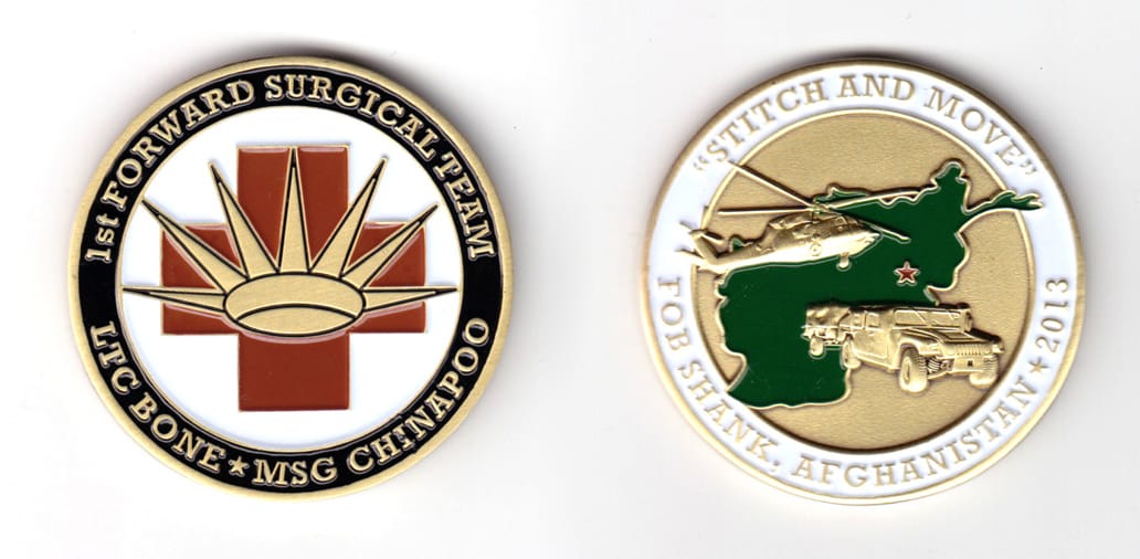 Round shaped coin, brass in color, 2 inches in diameter.