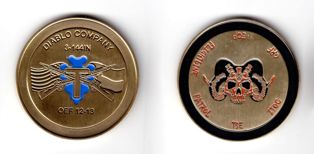 Round shaped coin, antique brass in color, 2 inches in diameter.