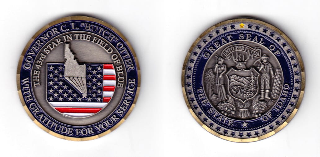 Round shaped coin, antique pewter in color, 1 31/32 inches in diameter.