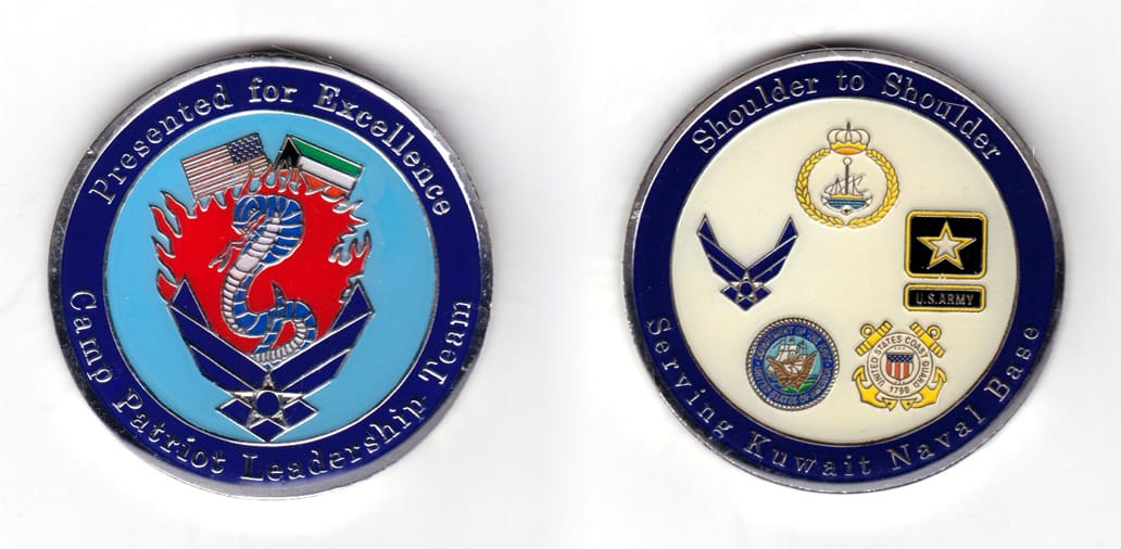 Round shaped coin, silver in color, 2 1/64 inches in diameter.