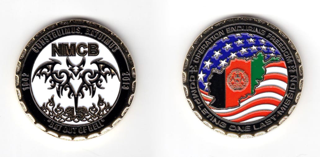 Round shaped coin, brass in color, 1 49/64 inches in diameter.