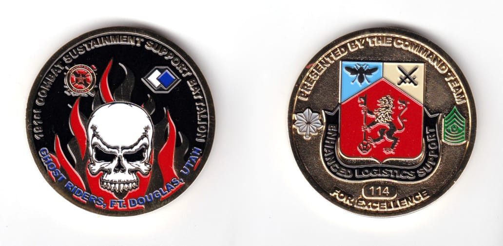 Round shaped coin, brass in color, 1 49/64 inches in diameter.