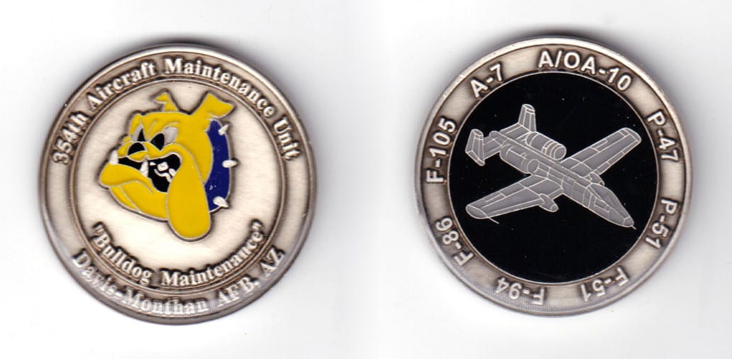 Round shaped coin, pewter in color, 1 31/64 inches in diameter.