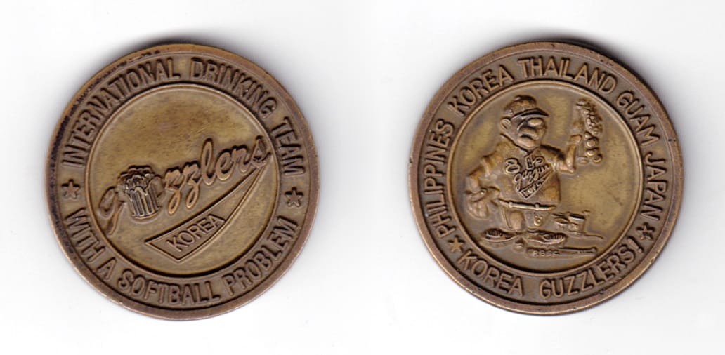 Round shaped coin, very antique brass in color, 1 39/64 inches in diameter.