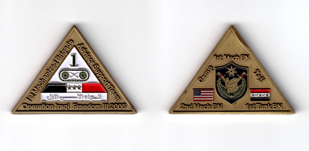 Triangular shaped coin, point up, antique brass in color, 1 15/16 inches high x 1 3/8 inches wide.