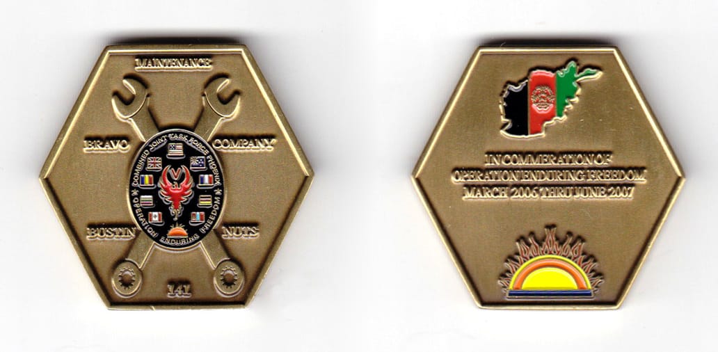 Hexagon shaped coin, antique brass in color, 1 35/64 inches in diameter.