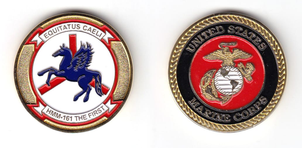 Round shaped coin, gold in color, 1 31/64 inches in diameter.