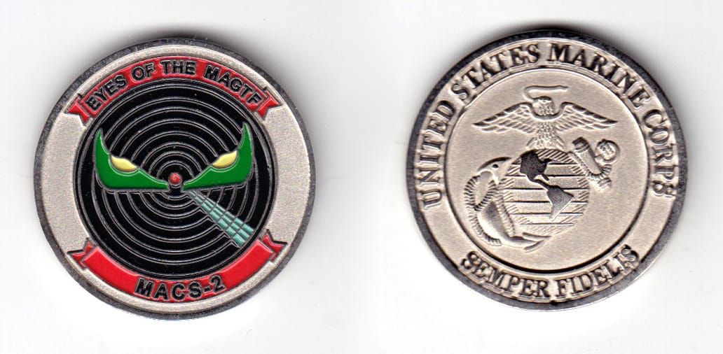 Round shaped coin, pewter in color, 1 33/64 inches in diameter.