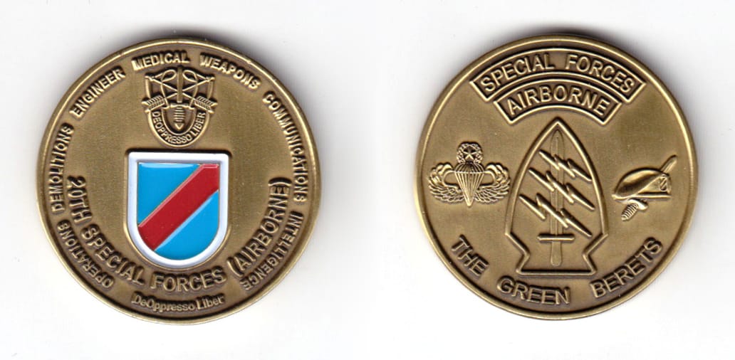 Round shaped coin, antique brass in color, 1 31/64 inches in diameter.