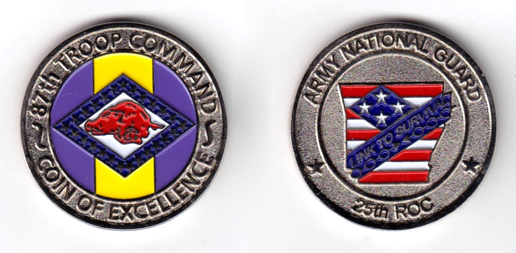 Round shaped coin, pewter in color, 1 33/64 inches in diameter.