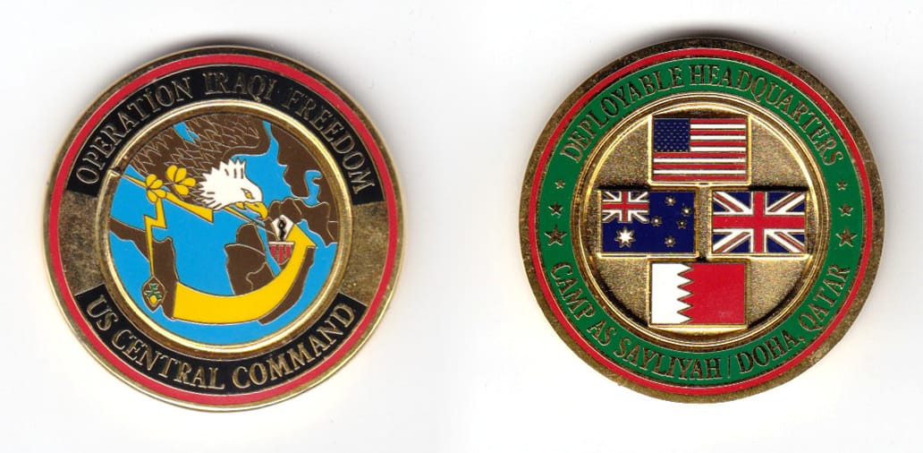 Round shaped coin, brass in color, 1 1/2 inches in diameter.