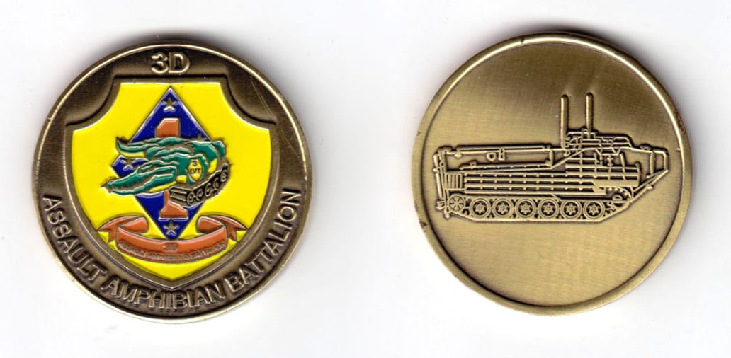 Round shaped coin, brass in color, 1 33/64 inches in diameter.