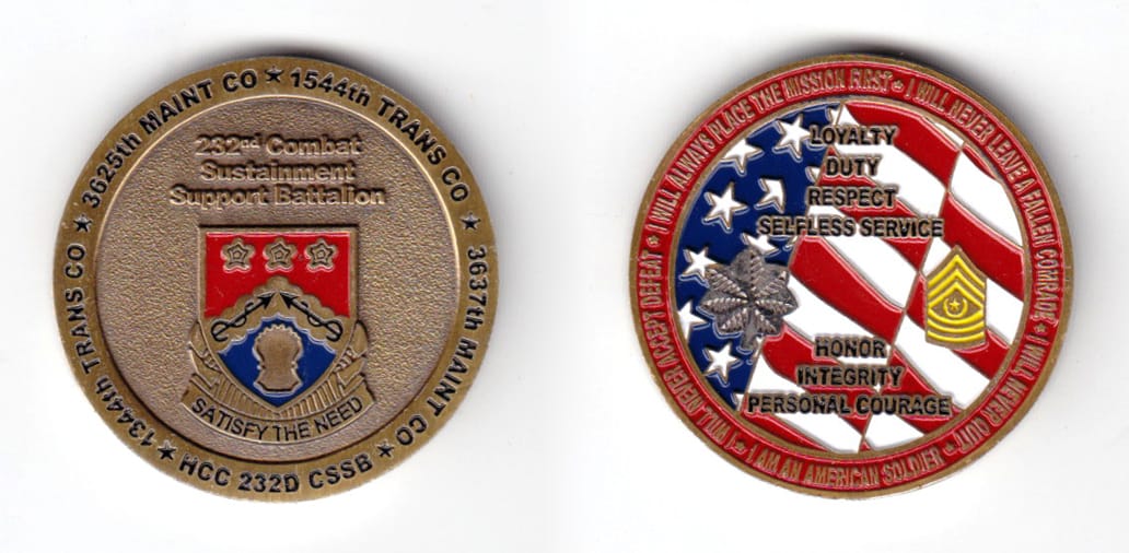 Round shaped coin, pewter in color, 1 1/2 inches in diameter.