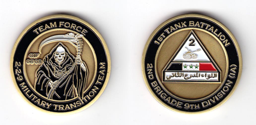 Round shaped coin, pewter in color, 1 1/2 inches in diameter.