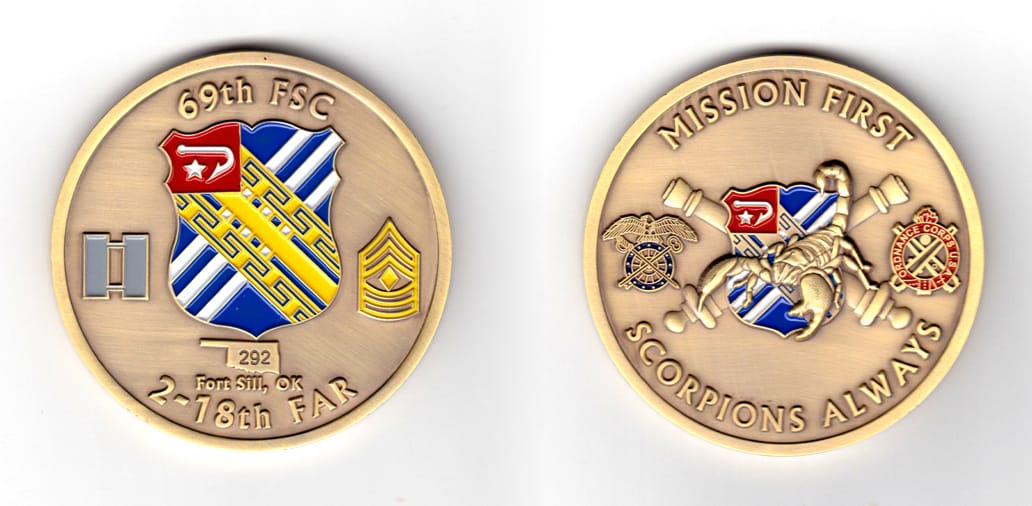 Round shaped coin, brass in color, 2 31/64 inches in diameter.