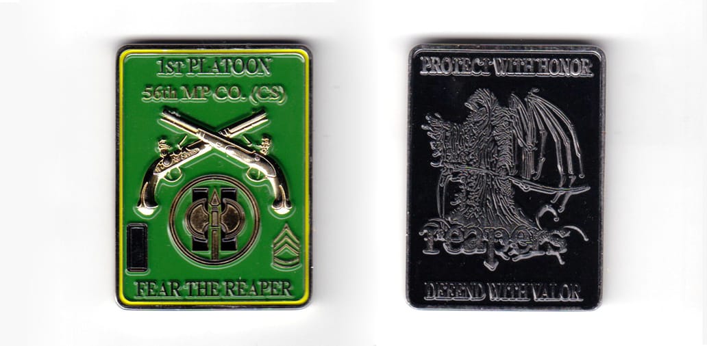 Rectangular shaped coin, pewter in color, 2 inches high x 1 37/64 inches wide.