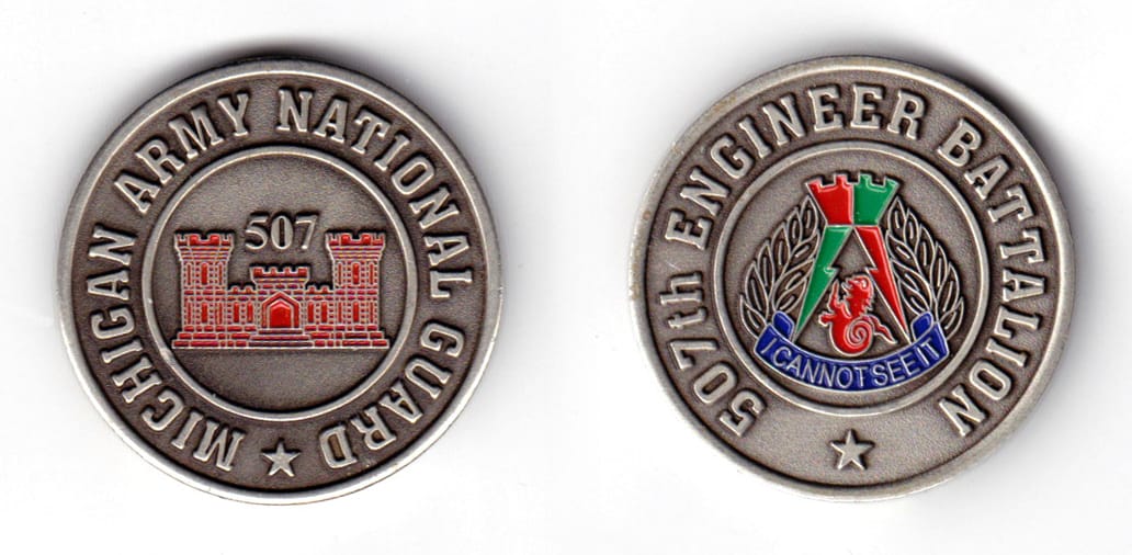 Round shaped coin, antique pewter in color, 1 1/2 inches in diameter.