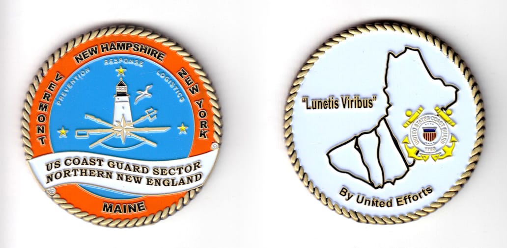 Round shaped coin antique brass in color, 1 61/64 inches in diameter.