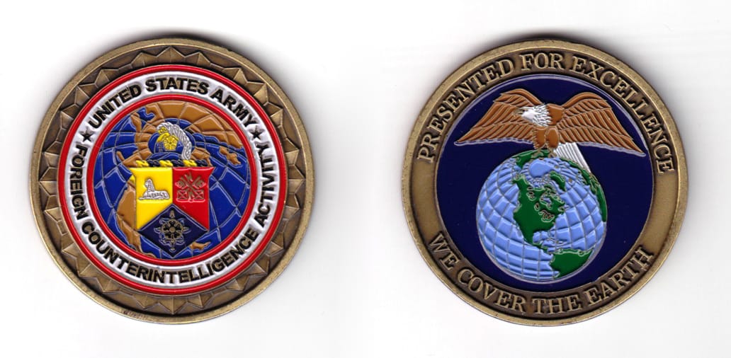 Round shaped coin, antique brass in color, 1 31/32 inches in diameter.